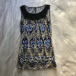 Blue and tan patterned blouse